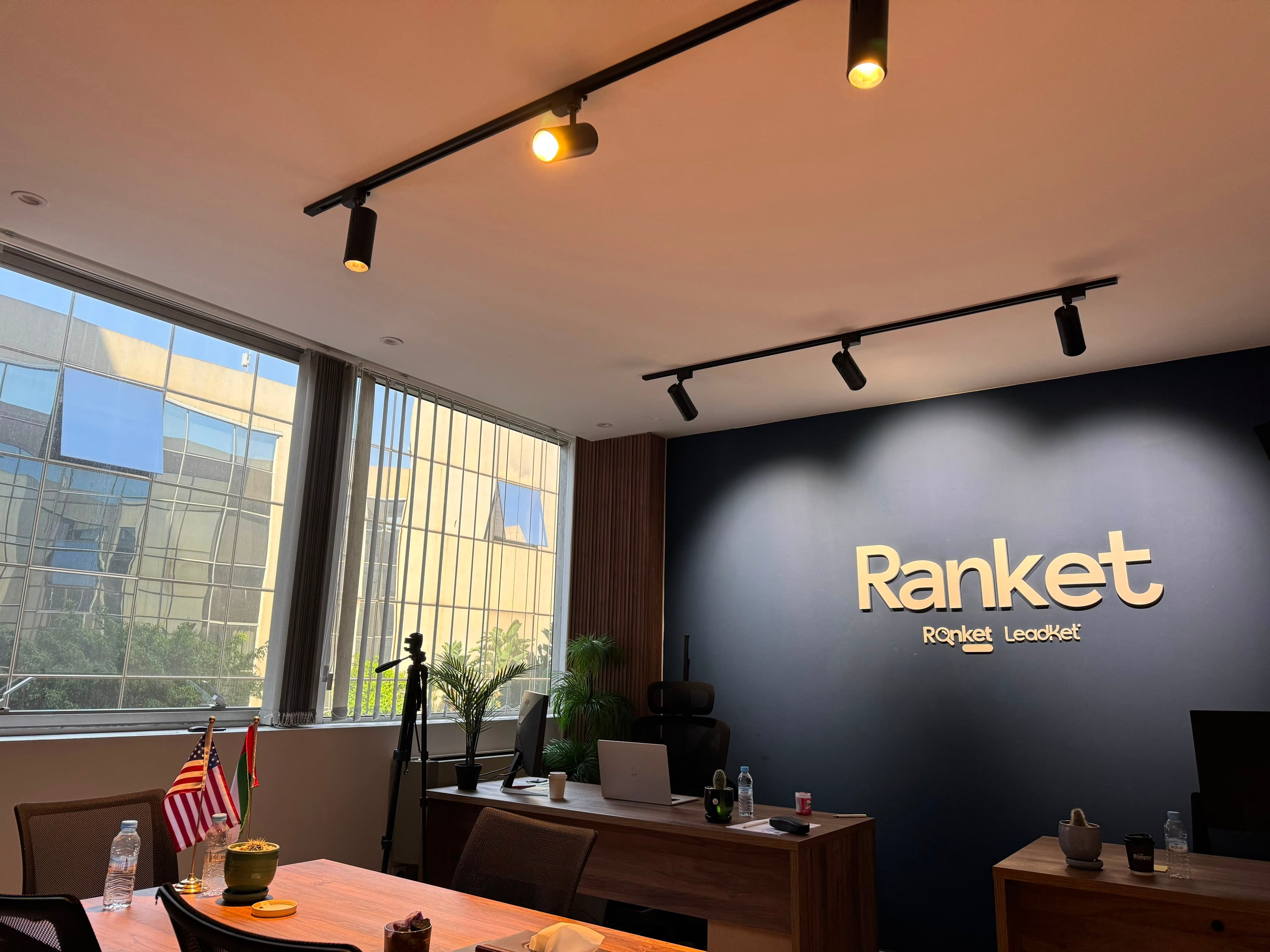 The Ranket office, with the Ranket and Leadket logos on a navy wall
